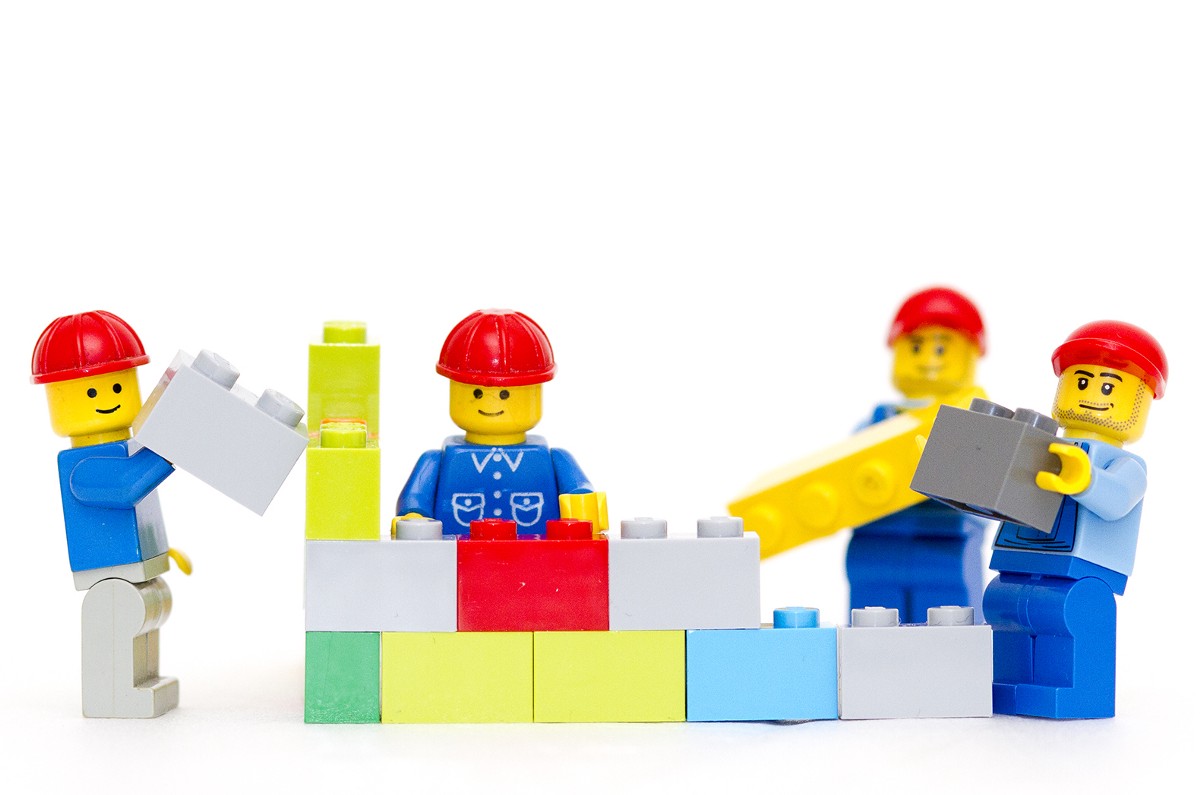 Lego men building a wall